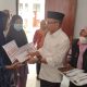 Pemkab Polman Serahkan Bantuan Rp50 Juta untuk 8 KK Korban Kebakaran